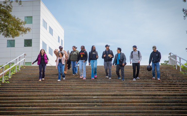 image of students going down the stairs