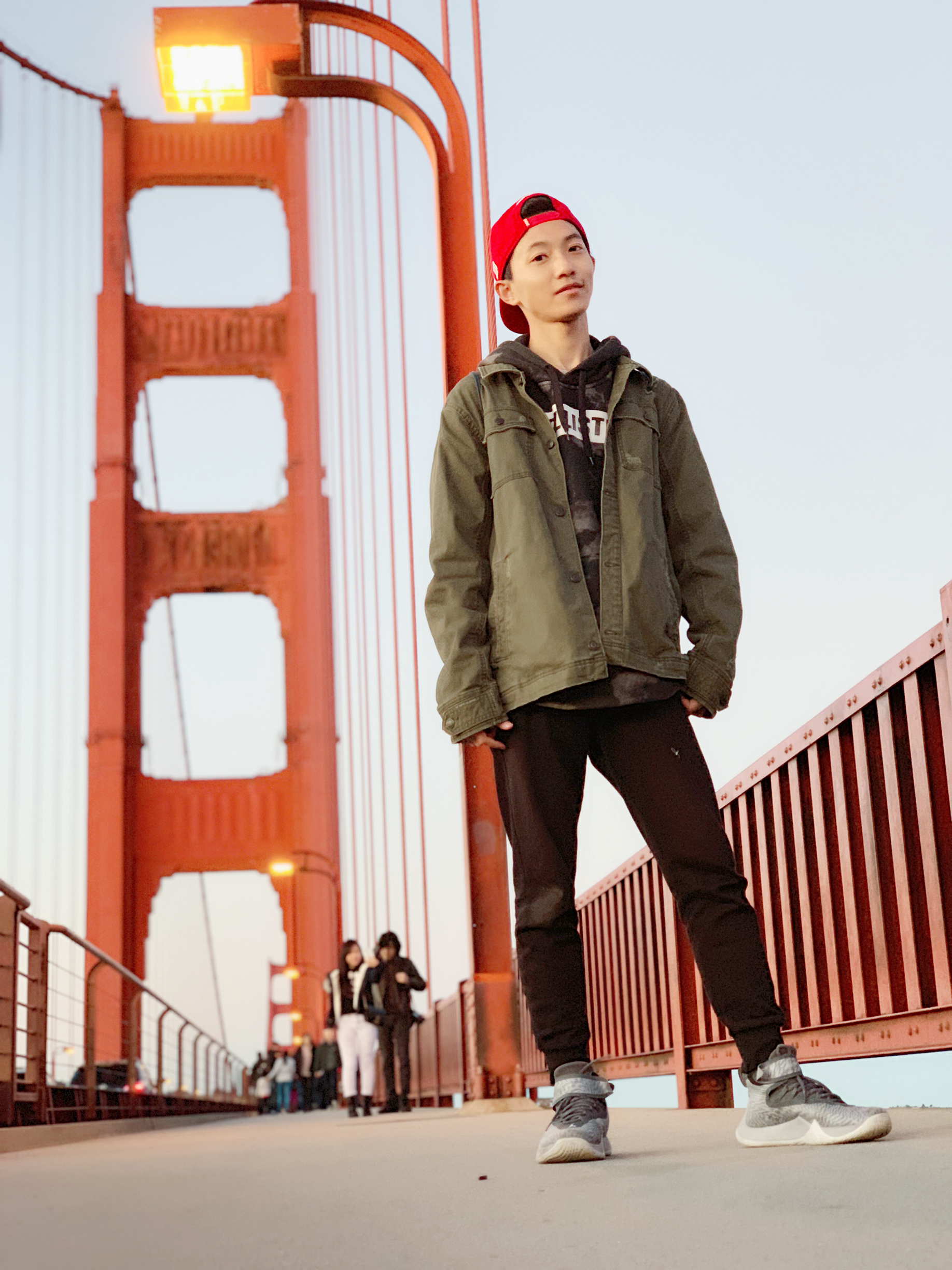 Xinchi Li standing at Golden Gate Bridge