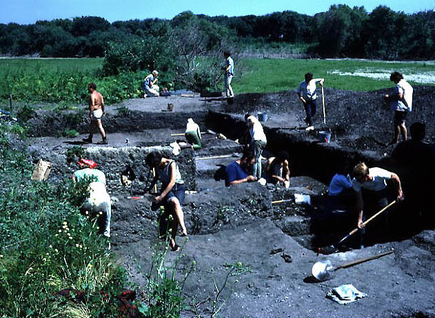 people digging at the site