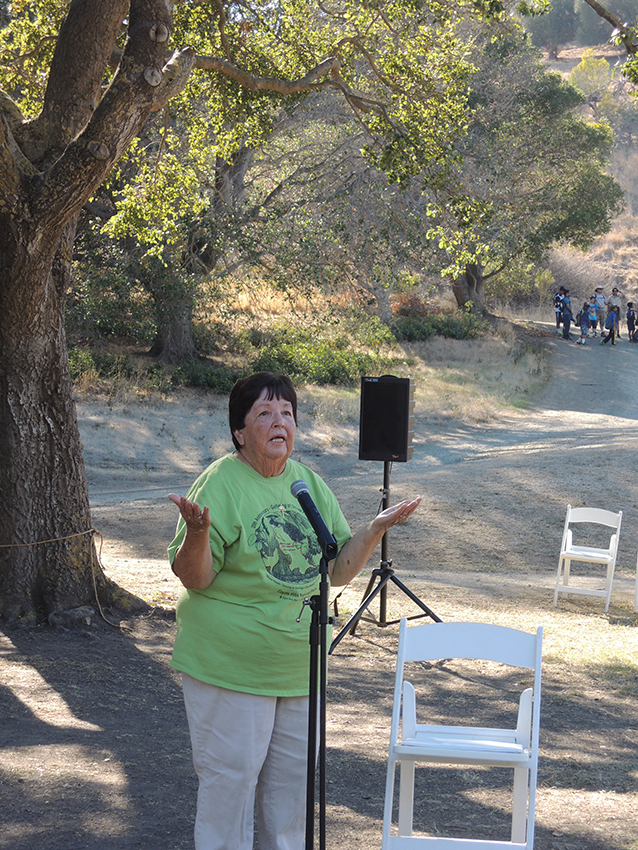 ruth standing at the mic