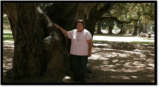 ruth standing next to oak tree