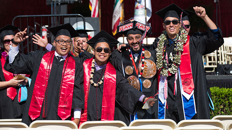 CSUEB Graduates celebrating