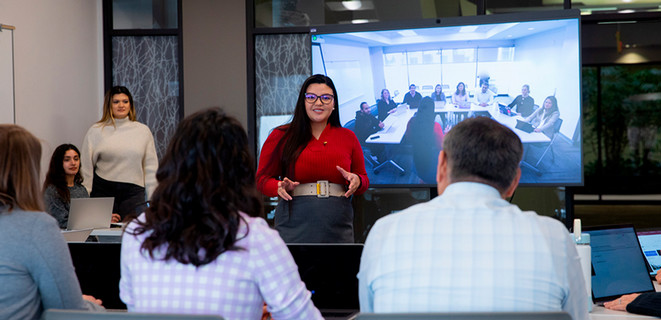 MBA students giving a presentation
