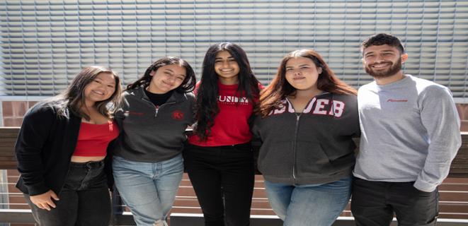 Five students standing for a picture