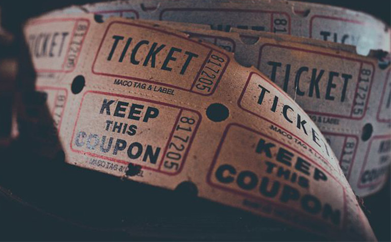 Purchase Tickets (image description: a roll of tickets)