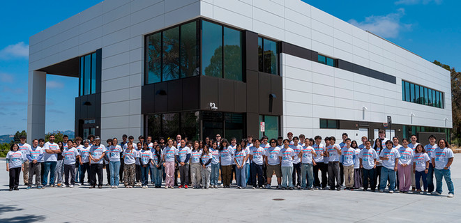 Discover Engineering camp students in front of the Braddock Building