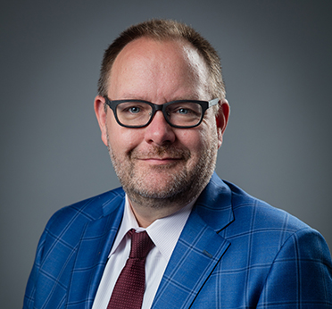 Headshot of Buddy James