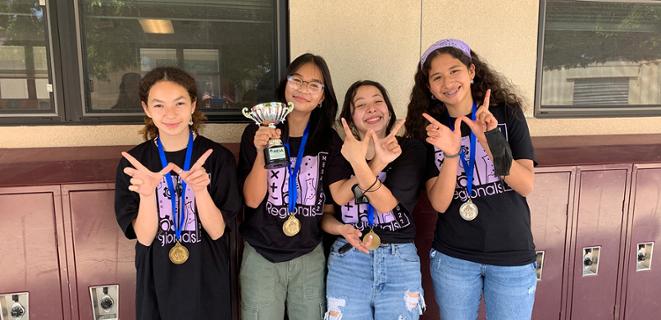 Four middle school girls from Cal State East Bay MESA with awards