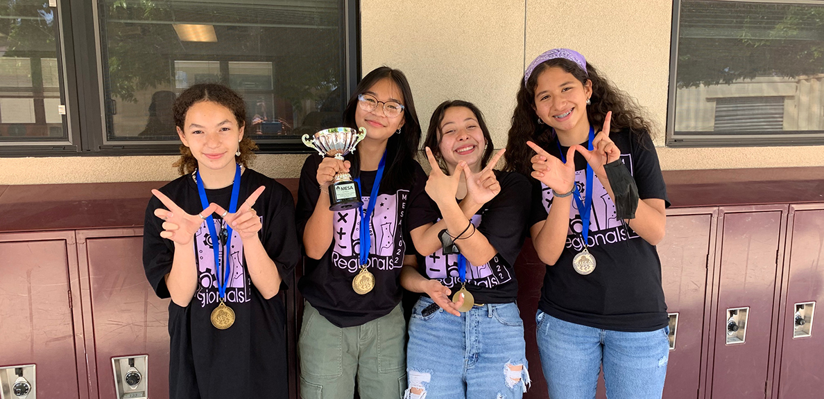 Four middle school girls from Cal State East Bay MESA with awards