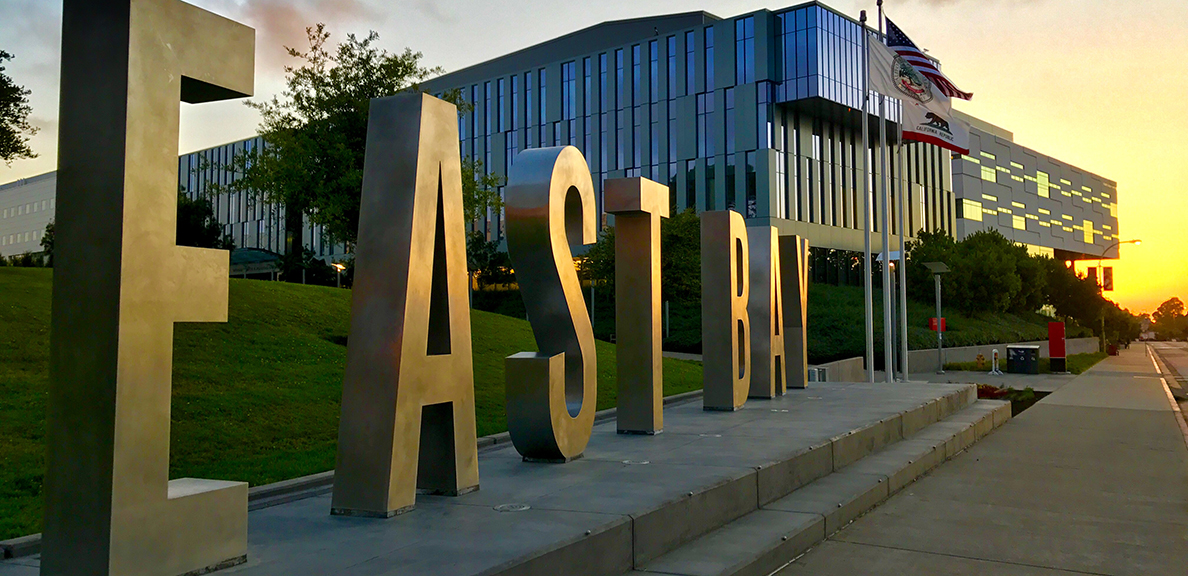 Cal State East Bay letters at sunset