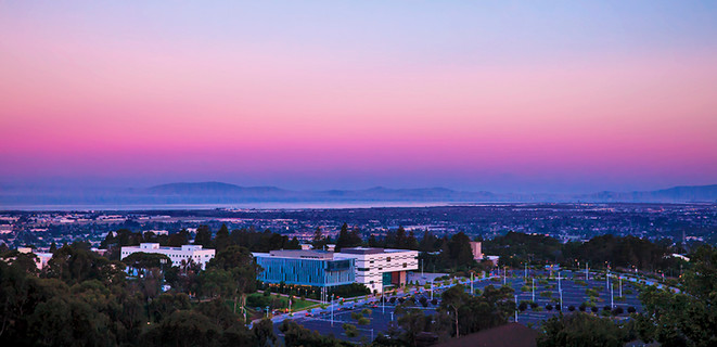 Aerial photo of a purple sunset over East Bay's Hayward campus