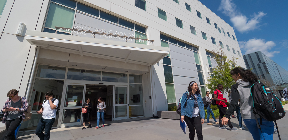 The front of the Valley Business and Technology Building with students outside