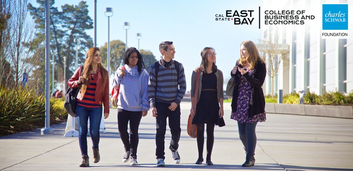 A group of students walking side by side in front of the Valley Business and Technology building