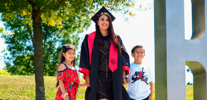 Graduating student with children