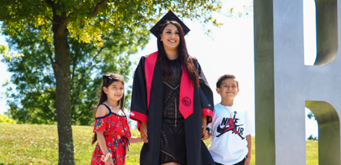 Graduating student with children