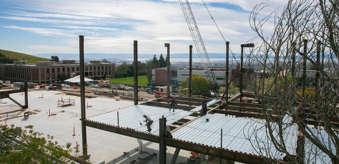 Aerial view of CORE building with bay view in background