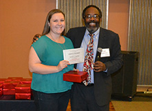 Sarah Jupina, with Paralegal Studies Director Dwight Dickerson, was one of 35 students honored during the Paralegal Studies Certificate program graduation ceremony in December.