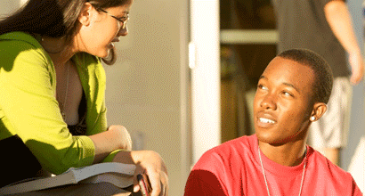 man and woman talking