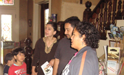 Woman conducting tour of historic house.