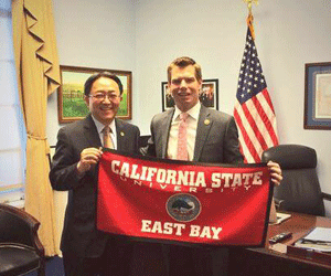 Cal State East Bay President Leroy M. Morishita is shown with East Bay Congressman Eric Swalwell in the representative's Washington, D.C. office.