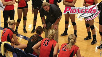  Jim Spagle coaching sports players on the bench