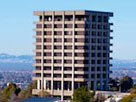 Thumbnail for the headline CSUEB’s former administration building, Warren Hall, to be demolished by implosion Aug. 17 