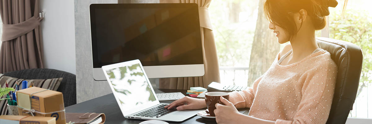 student looking at computer applying online