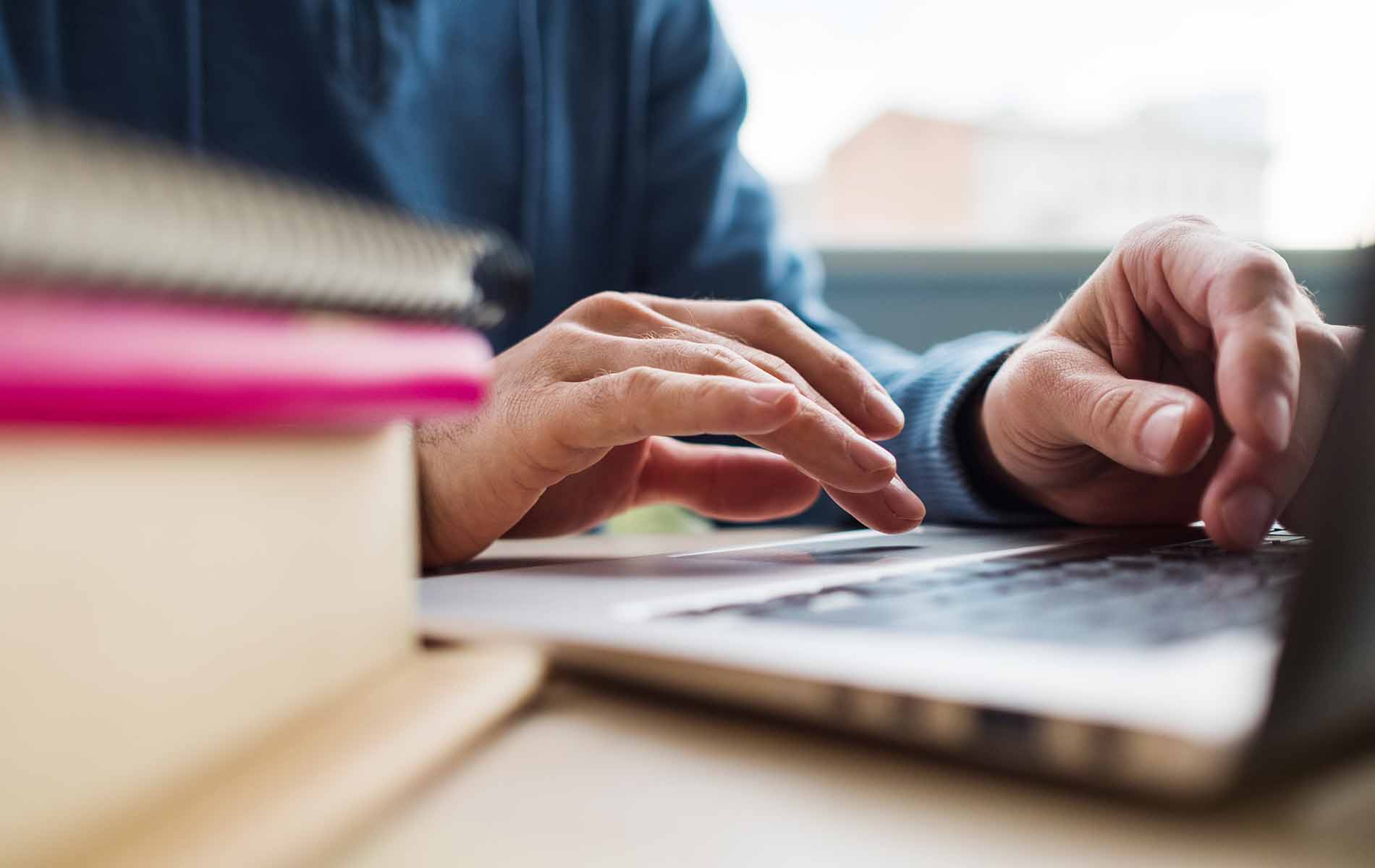 Student on laptop taking a class
