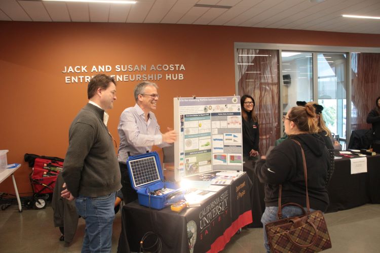 Guests visit our resource fair and get to know what East Bay has to offer them.