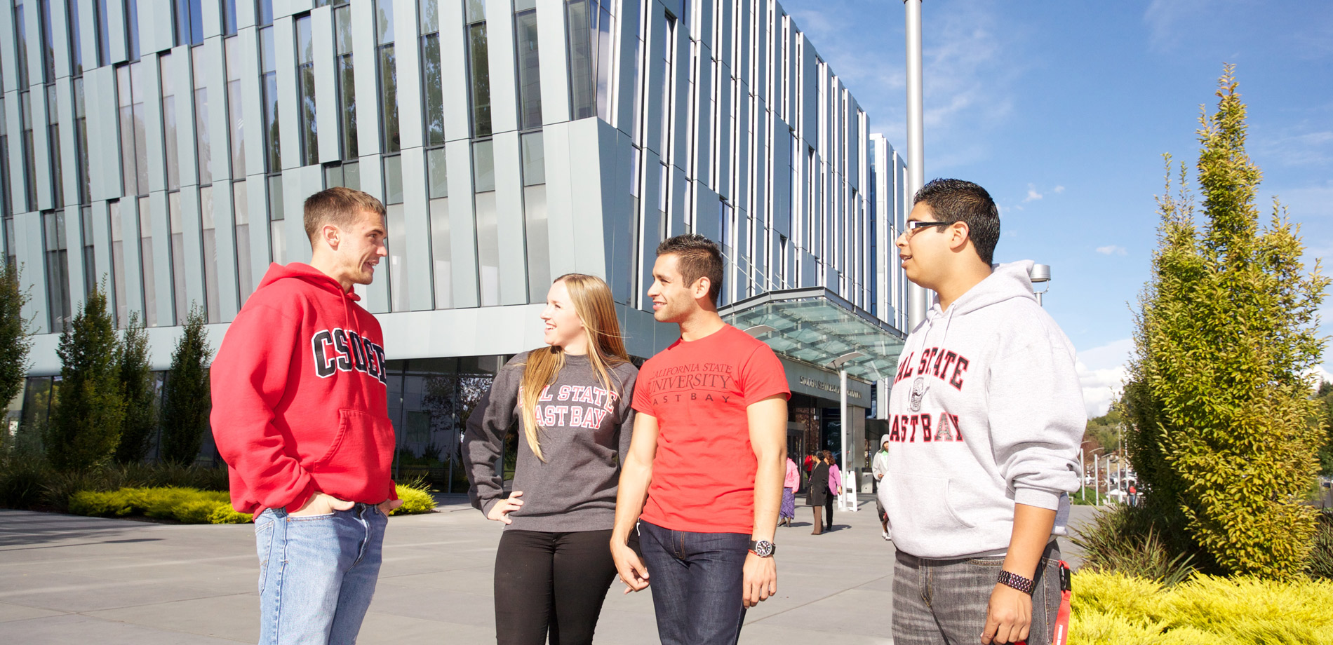 Students talking in front of SA building