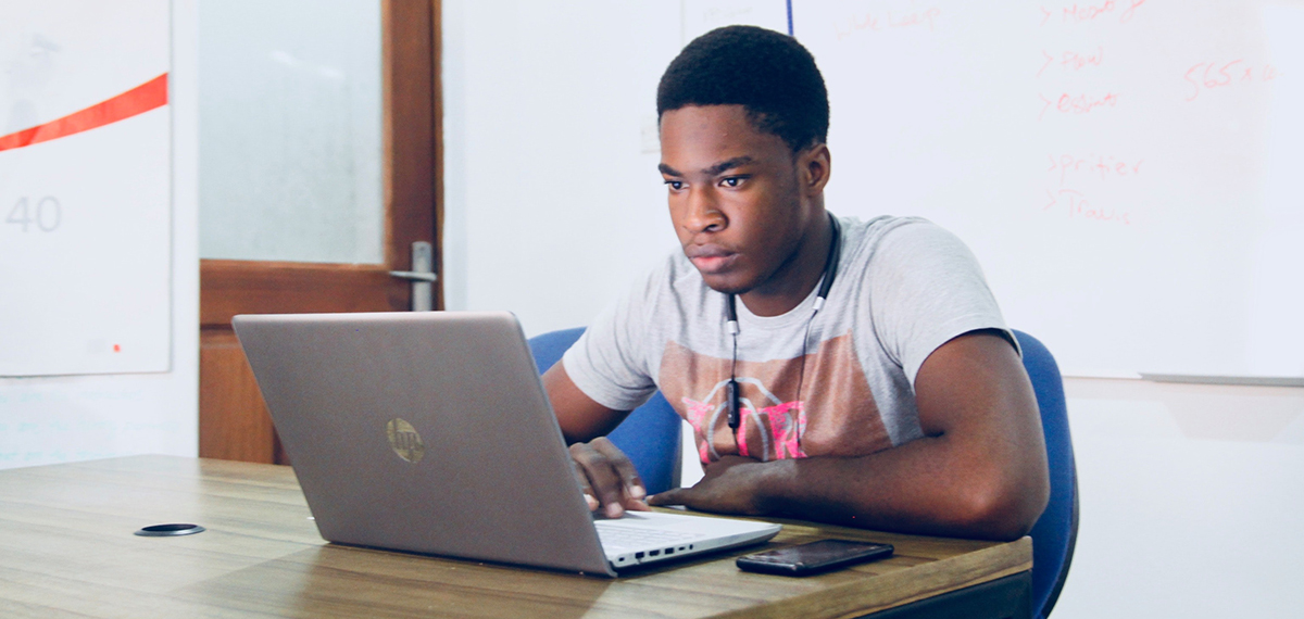 Student working on a laptop. Photo by Nesa by Makers on Unsplash.