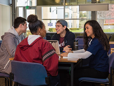 Students work at a table