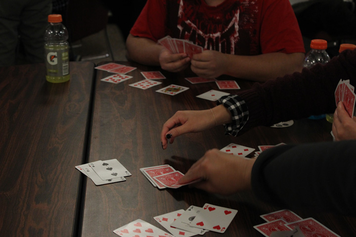Student Taking a Card from the Deck