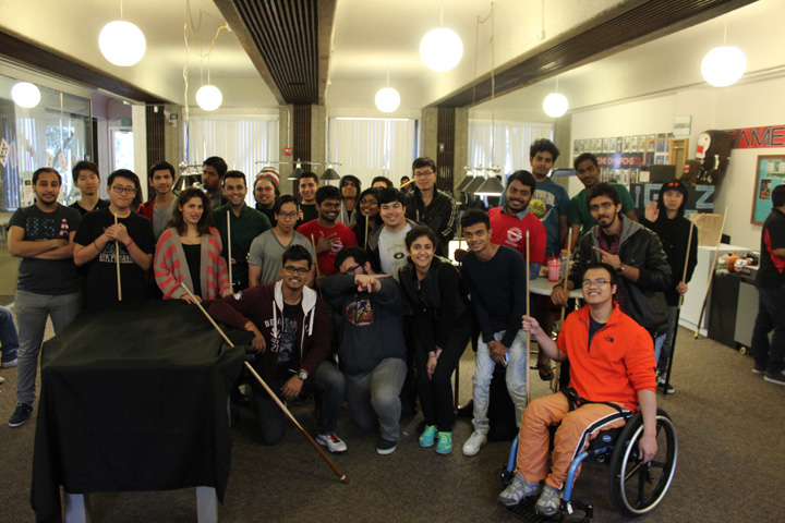 Group shot of Students with their Billiards Sticks